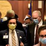 Peter Segall | Juneau Empire                                Sens. Scott Kawasaki, D-Fairbanks, and Bert Stedman, R-Sitka, leave the floor of the Alaska State Senate after voting to approve Gov. Mike Dunleavys distributions of over $1 billion in federal relief money. The senate adjourned sine die, meaning indefinitely, closing out the 31st Legislature. Wednesday.