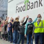 Employees of the Kenai Peninsula Food Bank stand next to their newly acquired delivery truck in Soldotna, Alaska, in this undated photo. (Photo courtesy Greg Meyer/Kenai Peninsula Food Bank)