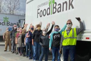 Employees of the Kenai Peninsula Food Bank stand next to their newly acquired delivery truck in Soldotna, Alaska, in this undated photo. (Photo courtesy Greg Meyer/Kenai Peninsula Food Bank)