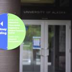 A sign on the University of Alaska Southeast campus in Juneau. Under a proposal being put before the UA Board of Regents next week, UAS could be merged with one of the other two schools in the system. (Peter Segall | Juneau Empire)