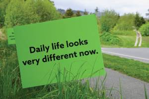 Signs along Poopdeck Street on Friday, May 29, 2020, in Homer, Alaska, offer inspiration during the COVID-19 pandemic. Put up by the South Kenai Peninsula Resiliency Coalition, the signs read Daily life loooks very different now. Routine and structure create a sense of safety. How can your daily rhythm support you? (Photo by Michael Armstrong/Homer News)