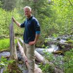 The author stands near his preferred crossing point on lower Shackleford Creek, near Cooper Landing, in this undated photo. (Photo provided by Clark Fair)