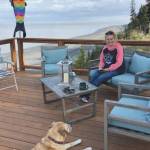 Photo provided by Ocean Bluff B&B                                Tammy Kehrer of Palmer sits on the deck overlooking Cook Inlet at Ocean Bluff B&B in Kasilof. Kehrer is the daughter of owner Kathy Carlisle.