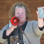 Cheryl Carattini speaks at the Black Lives Matter protest in Soldotna Creek Park on Saturday, May 6, 2020, in Soldotna, Alaska. Carattini used her smartphone so family members that were not present could see the crowd. (Photo by Jeff Helminiak/Peninsula Clarion)