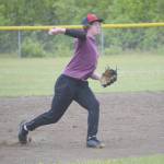 Jeff Helminiak / Peninsula Clarion                                 Alaska 20 shortstop Mose Hayes throws to first base during practice Monday at the Soldotna baseball fields in Soldotna.
