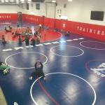 Soldotna Whalers Wrestling Club athletes Sean Babitt (bottom) and Wayne Mellon work drills Wednesday at the Future of Champions camp at the All American Training Center just outside of Soldotna.