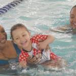 Photo by Jeff Helminiak/Peninsula Clarion                                Cheryl Arrington, Finley Hendrickson and JJ Hendrickson swim at the Nikiski Pool in Nikiski on Friday, June 12. Arrington is Finleys grandmother, while JJ is Finleys mother. The family were celebrating JJs birthday.