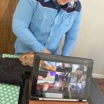 Colton Rankin, member of the North Road Rangers 4-H Club, participates in a 4-H workshop on Zoom with his rabbit on April 9, 2020. (Photo courtesy Cassy Rankin/Kenai Peninsula District 4-H)
