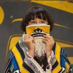 Courtesy Photo | Sydney Akagi Photography for Lily Hope                                Elizabeth Hope holds up the Chilkat Protector Mask at a ceremony.