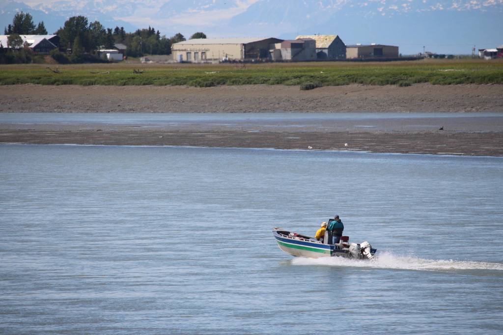 Fishermen head upstream on the Kenai River during the first day of dipnetting on July 10, 2020. (Photo by Brian Mazurek/Peninsula Clarion)