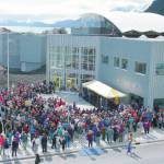 FILE - In this May 2, 1998 file photo, people attend the official opening of the Alaska SeaLife Center, a wildlife hospital and research center on the shores of Resurrection Bay in Seward, Alaska. The Alaska SeaLife Center is in jeopardy of closing after concerns surrounding the coronavirus pandemic have drastically reduced visitation rates. (AP Photo/Al Grillo, File)