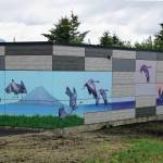 A mural by David Pettibone and Austin Parkhill is part of the 1% for art work on the new Homer Police Station, as seen here on June 25, 2020, in Homer, Alaska. (Photo by Michael Armstrong/Homer News)