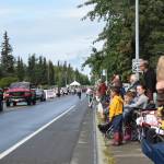 Onlookers await the passing of parade floats at the Progress Days Parade in Soldotna on July 27, 2019. (Photo by Brian Mazurek/Peninsula Clarion)