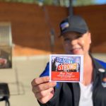 Shanon Davis, Executive Director of the Soldotna Chamber of Commerce, shows off one of the stamp cards used in the Chambers Soldotna Strong Shop Local campaign during Progress Days in Soldotna Creek Park on July 22, 2020. (Photo courtesy Shanon Davis)