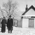 Beverly Christensen photo from Once Upon the Kenai
Beverly and Joe Sabrowski pose in front of the Kenai Post Office in 1935. Beverly was postmaster at this time.