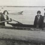 Beverly Sabrowski (with oars) in a boat at the mouth of the Kenai River in September 1929. Her passengers are (from left): Marie Hermansen, Susie March and Sabrowskis mother, Gertrude Cox. (Beverly Christensen photo from Once Upon the Kenai)