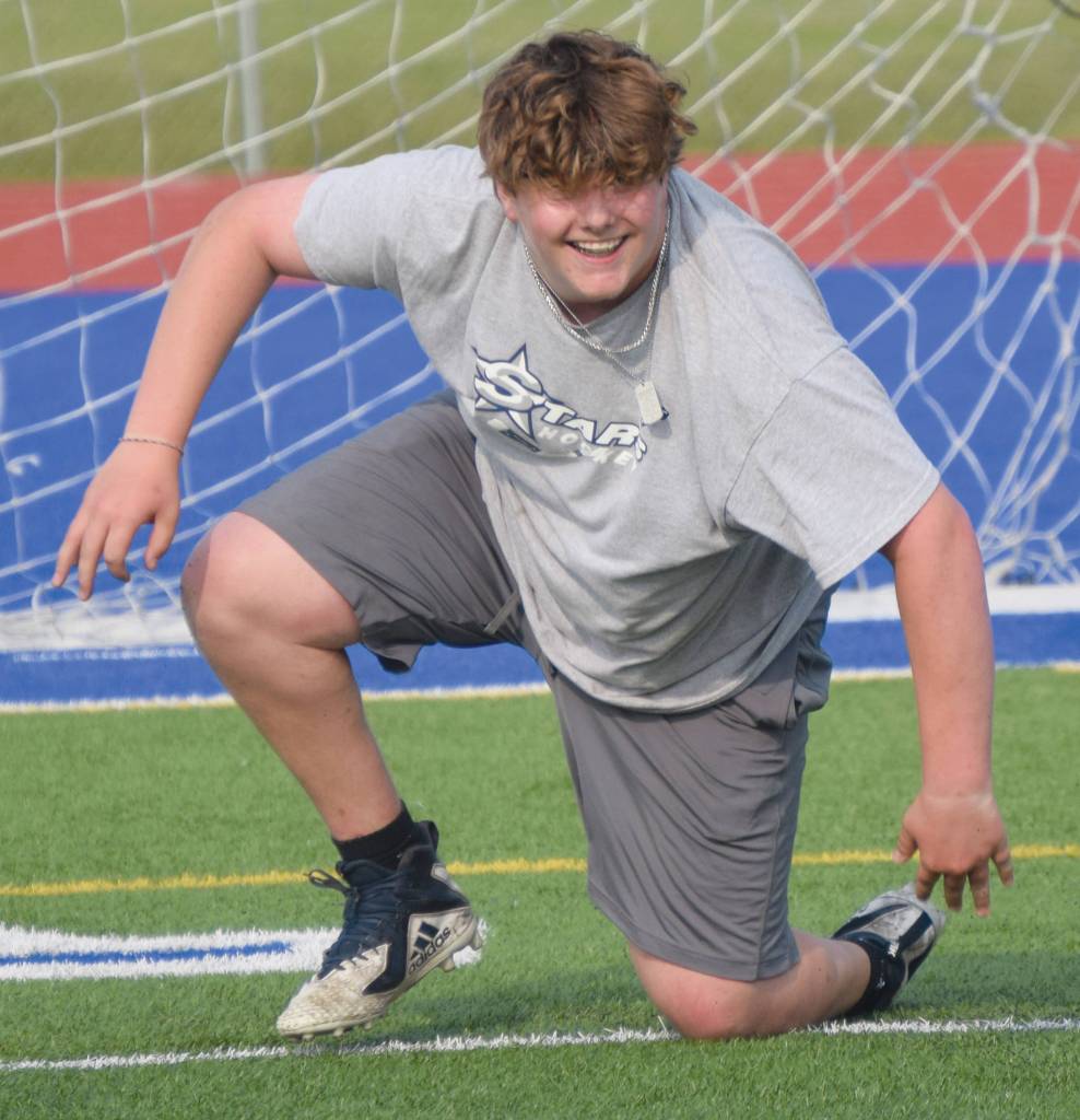 Spencer Kapp completes a drill on the first day of football practice at Soldotna High School on Wednesday, July 29, 2020, in Soldotna, Alaska. (Photo by Jeff Helminiak/Peninsula Clarion)