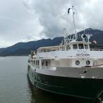 The Wilderness Adventurer is shown Wednesday, Aug. 5, 2020, following its return to Juneau, Alaska, after one of its 36 passengers tested positive for COVID-19. The first cruise of the stunted season was cut short, and all passengers were required to quarantine at a hotel while the 30 crew members were to quarantine on the ship. (AP Photo/Becky Bohrer)