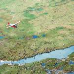 In this undated photo provided by the U.S. Fish and Wildlife Service, an airplane flies over caribou from the Porcupine Caribou Herd on the coastal plain of the Arctic National Wildlife Refuge in northeast Alaska.The Department of the Interior has approved an oil and gas leasing program within Alaskas Arctic National Wildlife Refuge. The refuge is home to polar bears, caribou and other wildlife. Secretary of the Interior David Bernhardt signed the Record of Decision, which will determine where oil and gas leasing will take place in the refuges coastal plain. (U.S. Fish and Wildlife Service via AP)