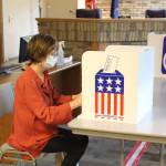 Kim Lofstedt casts her vote early in Alaskas Primary Election at Kenai City Hall on Aug. 17, 2020. (Photo by Brian Mazurek/Peninsula Clarion)