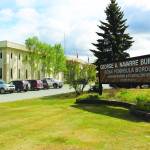 The entrance to the Kenai Peninsula Borough building in Soldotna is seen here on June 1. (Photo by Brian Mazurek/Peninsula Clarion)