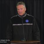 Gov. Mike Dunleavy speaks at a press conference on Aug. 18, 2020, held in Anchorage, Alaska while a sign-language interpreter, lower left, signs. (Livestream screenshot courtesy Office of the Governor)