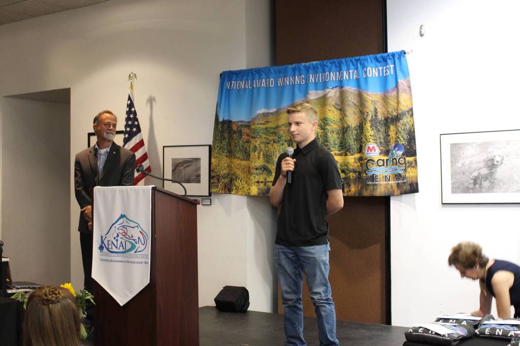Andrew Gaethle, a student at Kenai Central High School, talks about his project to reduce beetle-killed trees on the Kenai Peninsula during the Caring for the Kenai Awards Ceremony at the Kenai Visitor Center on Aug. 19, 2020. (Photo by Brian Mazurek/Peninsula Clarion)                                Andrew Gaethle, a student at Kenai Central High School, talks about his project to reduce beetle-killed trees on the Kenai Peninsula during the Caring for the Kenai Awards Ceremony at the Kenai Visitor Center on Aug. 19, 2020. (Photo by Brian Mazurek/Peninsula Clarion)