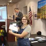 Nekoda Cooper smiles with her award for being a Caring for the Kenai Finalist during the Caring for the Kenai Awards Ceremony at the Kenai Visitor Center on Aug. 19, 2020. (Photo by Brian Mazurek/Peninsula Clarion)