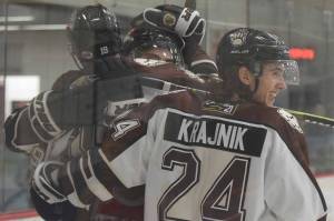 Eagle Rivers Zach Krajnik and teammates celebrate the second-period goal of Michael Spethmann against the Chippewa (Wisconsin) Steel on Friday, Oct. 5, 2018, at the Soldotna Regional Sports Complex. (Photo by Jeff Helminiak/Peninsula Clarion)