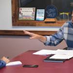 Jeff Helminiak/Peninsula Clarion                                Peninsula Clarion reporter Brian Mazurek (left) interviews Republican Sen. Dan Sullivan of Alaska on Thursday at the Peninsula Clarion in Kenai.