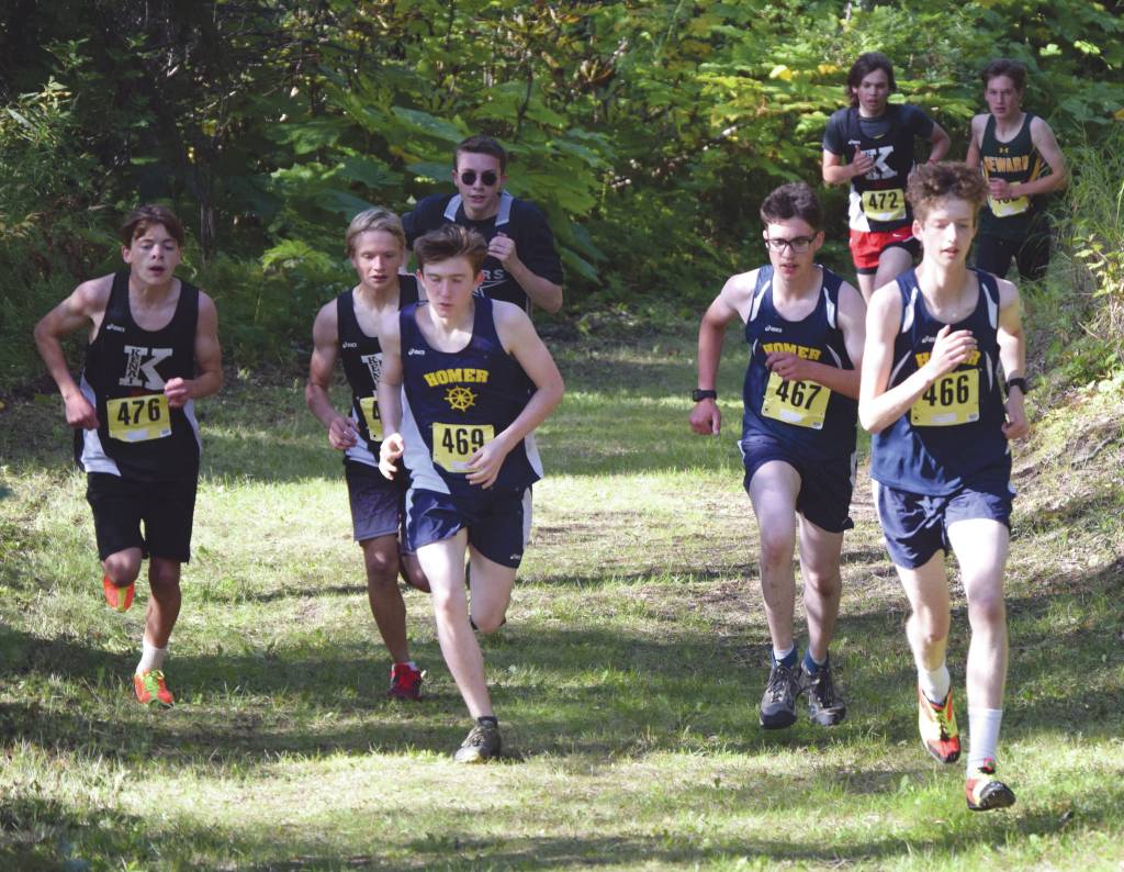 Homer sophomore Seamus McDonough takes control of the freshman-sophomore boys race at the Nikiski Class Races on Friday, Sept. 4, 2020, at Nikiski High School in Nikiski, Alaska. (Photo by Jeff Helminiak/Peninsula Clarion)