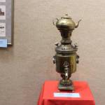 An antique brass samovar is seen here on display at the Kenai Visitor and Cultural Center on Sept. 4, 2020. (Photo by Brian Mazurek/Peninsula Clarion)