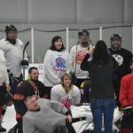Libertarian presidential candidate Jo Jorgensen poses with Juneau hockey players during her visit to Juneau on Tuesday, Sept. 8, 2020. (Peter Segall / Juneau Empire)