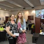 Leslie Rohr, left, and Regan Evans, right, attend the Caring for the Kenai Awards Luncheon at the Kenai Visitor and Cultural Center on Aug. 19, 2020. Evans project with Caring for the Kenai was the catalyst for the recent collaboration between Rohr  who is the executive director of Love, INC.  and Marnie Alcott, CEO of the Challenger Learning Center. (Photo by Brian Mazurek/Peninsula Clarion)