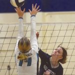 Soldotnas Bethany Richmond attacks Nikiskis Bryli Mullin on Thursday, Sept. 10, 2020, at Soldotna High School in Soldotna, Alaska. (Photo by Jeff Helminiak/Peninsula Clarion)