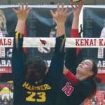 Kenai Centrals Abby Every tips over Homers Tonda Smude on Friday, Sept. 18, 2020, at Kenai Central High School in Kenai, Alaska. (Photo by Jeff Helminiak/Peninsula Clarion)