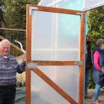 Mike OBrien, owner of OBrien Garden and Trees, leads a tour through the high tunnels during the annual apple tasting in Nikiski, Alaska on Sept. 19, 2020. (Photo by Brian Mazurek/Peninsula Clarion)