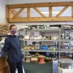 Amy Anderson, president and co-founder of BuildUP, a nonprofit thrift store for building materials, stands in the new BuildUP space that was leased thanks to the money donated by the Soldotna 100+ Women Who Care group on Sept. 24, 2020. (Photo by Brian Mazurek/Peninsula Clarion)