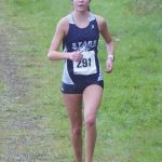 Soldotnas Erika Arthur runs to second place in the Kenai Peninsula Borough cross-country race Saturday, Sept. 26, 2020, at Tsalteshi Trails just outside of Soldotna, Alaska. (Photo by Jeff Helminiak/Peninsula Clarion)