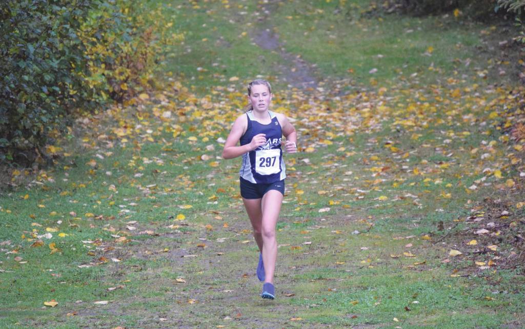 Soldotnas Jordan Strausbaugh runs to victory in the Kenai Peninsula Borough cross-country meet Saturday, Sept. 26, 2020, at Tsalteshi Trails just outside of Soldotna, Alaska. (Photo by Jeff Helminiak/Peninsula Clarion)