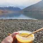 The author enjoys butternut squash soup while picnicking are Eklutna Lake, on Sunday, Sept. 27, 2020 in Anchorage, Alaska. (Photo by Victoria Petersen/Peninsula Clarion)