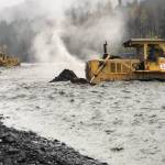 Photo courtesy KPB Incident Management Team                                 Heavy equipment operators attempt to mitigate flooding in Kwechak Creek in Seward on Saturday.