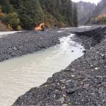 Photo courtesy KPB Incident Management Team                                 Heavy equipment operators attempt to mitigate flooding in Box Canyon in Seward on Saturday.