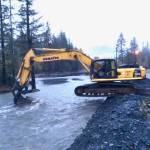Photo courtesy KPB Incident Management Team                                 Heavy equipment operators attempt to mitigate flooding in Seward on Saturday.