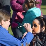 Children get their face painted Saturday, Oct. 12, 2019, at the fourth annual Fall Pumpkin Festival at Millenium Square in Kenai, Alaska. t. (Photo by Joey Klecka/Peninsula Clarion)