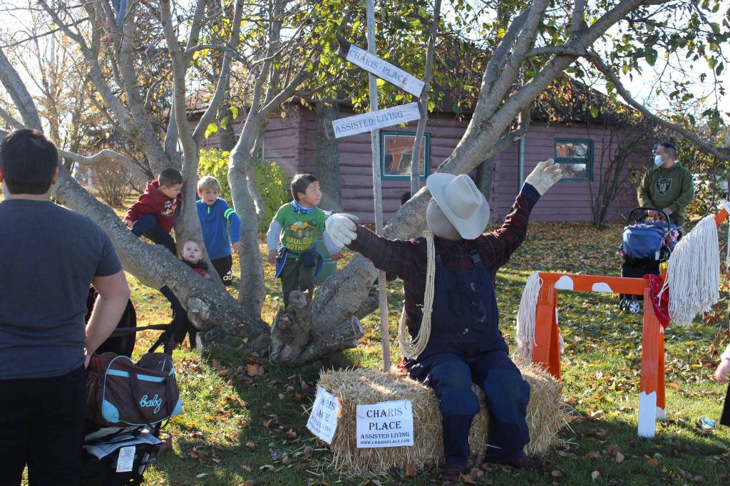 A scarecrow designed by Charis House Assisted Living is seen here during the 5th annual Kenai Fall Pumpkin Festival in Kenai, Alaska on Oct. 10, 2020. (Photo by Brian Mazurek/Peninsula Clarion)