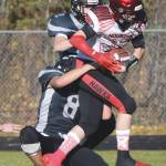 Nikiskis Simon Grenier and Holden Warnke stop Houstons Gordon Ratcliffe just short of the end zone with no time left in the first half Saturday, Oct. 10, 2020, at Nikiski High School in Nikiski, Alaska. (Photo by Jeff Helminiak/Peninsula Clarion)