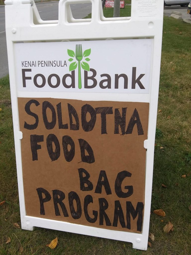 A sign advertising the City of Soldotnas food bag program is seen here outside Hospice of the Central Peninsula in Soldotna, Alaska on Oct. 8, 2020. (Photo courtesy Suzie Smalley)