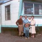 About a year after the Fairs moved onto their new homestead, they posed in front of their trailer for this photo. L-R, Calvin, his visiting mother Mary, Clark (age 5), Janeice (nearly age 2), and Jane. courtesy of the Fair Family Collection.