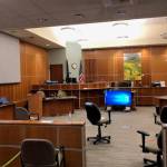 Social distancing measures, including TVs for exhibits and marked spaces on the floor, taken to address the coronavirus pandemic are shown inside a courtroom at the Kenai Courthouse in this October 2020 photo. (Photo courtesy Judge Jennifer Wells)